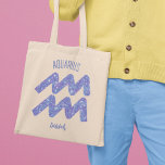 Pretty Aquarius Purple Astrology Sign Personalised Tote Bag<br><div class="desc">This pretty,  personalised purple and lavender Aquarius tote bag features your astrological sign from the Zodiac in a beautiful sparkle like the constellations. Customise this cute gift with your name in beautiful cursive script for someone with a late January or early February birthday.</div>