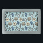 Pretty Blue Shell Starfish Sea Pattern Rectangular Belt Buckle<br><div class="desc">This pretty, blue and cream seashell and starfish pattern conjures up images of the beach and summer. There are five varieties of shells in the design and one starfish. Perfect for nautical / beach / ocean / coastal theme style and decor. The light blue background colour can be customised to...</div>