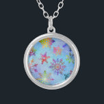 Pretty Colourful Snowflakes Christmas Pattern Silver Plated Necklace<br><div class="desc">This beautiful Christmas / winter pattern design features snowflakes with a tiedyed,  marbled effect in a rainbow of colours on a blue background. The snowflakes seem to glow and shine in this pretty wintery,  modern pattern. Use as a background for your holiday text or photos or enjoy it as-is.</div>