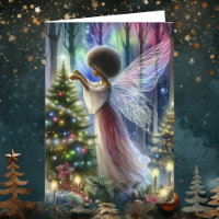 Pretty Fairy Decorating the Christmas Tree 