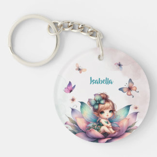 Pretty fairy sitting inside flower key ring