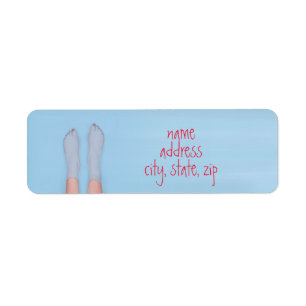 pretty feet soaking in the cool water  label