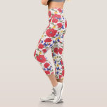 Pretty Floral Print Red Poppies Blue Wildflowers Capri Leggings<br><div class="desc">Super cute capri leggings featuring a red and blue wildflower pattern highlighted by butterflies.  You're sure to get many compliments on these comfortable,  high quality leggings that are perfect for the gym or just hanging out.</div>