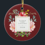 Pretty Girly Flowers Baby's First Christmas Ceramic Tree Decoration<br><div class="desc">This beautiful ornament features lovely watercolor style pink peonies and grey and green leaves on a burgundy background. A square frame with faux gold foil is in the centre, and you can personalise with your baby's name and any message or year by using the template. (PLEASE NOTE: the gold look...</div>