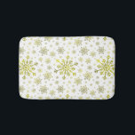 Pretty Gold Christmas Snowflakes on Winter White Bath Mat<br><div class="desc">Mixed sized pretty yellow gold snowflakes are scattered throughout this Christmas seasonal pattern. This cute festive design with a crisp winter white background is sure to please any age and perfect for anyone who likes soft and delicate xmas patterns.</div>