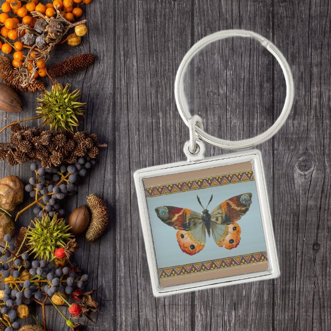 Pretty Monarch Butterfly Abstract Border Key Ring (Pretty monarch butterfly in oranges blues with triangle border on keychain.)