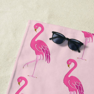 Pretty pink flamingos on a pink background beach towel