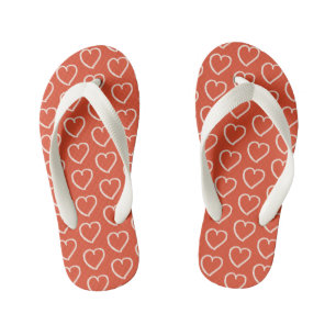 Pretty pink hearts on red kid's flip flops