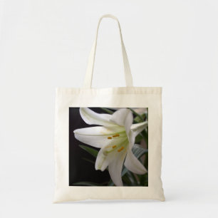 Pretty, pure white Easter lily flower in black Tote Bag