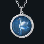 Pretty white swan floating on a blue lake silver plated necklace<br><div class="desc">A lovely nature scene of a white swan swimming on a peaceful blue lake. The dark blue shadows contrasts nicely with the soft blue lighting on this peaceful swan.</div>