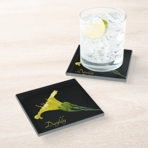 Pretty yellow daylily on black glass coaster