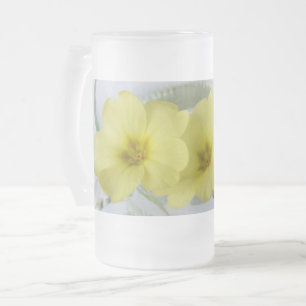 primrose in a coffee cup