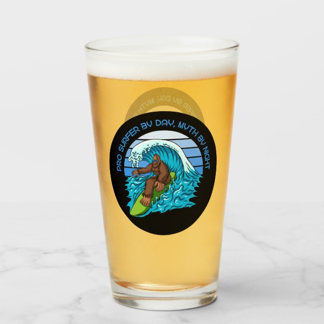 Pro By Day, Myth By Night Surfing Bigfoot Beer Glass (Front Filled)