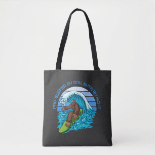 Pro By Day, Myth By Night Surfing Bigfoot Black Tote Bag