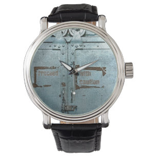 Proceed with caution blue grey industrial door watch