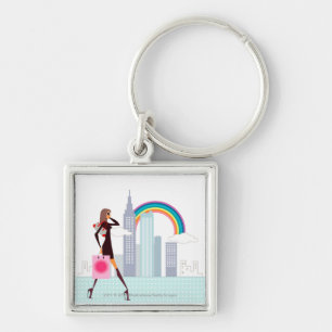 Profile of a woman walking holding a shopping bag key ring