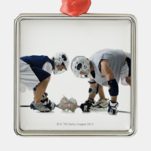 Profile of two young men playing lacrosse metal tree decoration