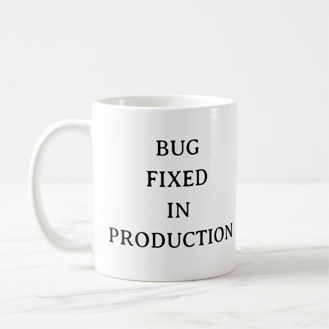 Programmer Humor Mug – Bug Fixed in Production (Left)