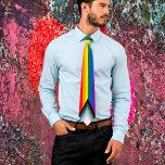 Progress Rainbow Flag & Pride Tie / LGBTQ<br><div class="desc">Neck Tie: Rainbow Flag & the "Progress" variation adds a chevron along the hoist that features black, brown, light blue, pink, and white stripes to bring those communities (marginalised people of colour, trans individuals, and those living with HIV/AIDS and those who have been lost) to the forefront; "the arrow points...</div>