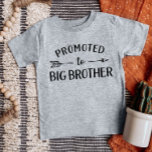 Promoted to Big Brother Matching Sibling Baby T-Shirt<br><div class="desc">Custom printed apparel personalised with "Promoted to Big Brother" graphic in trendy modern fonts with a boho arrow design. Perfect for a pregnancy announcement photo or a gift for older siblings when new baby arrives! Use the design tools to edit the colours or add your own text and photos to...</div>