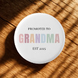Promoted to Grandma EST 2025  3 Cm Round Badge<br><div class="desc">Make the big announcement even more special with this charming “Promoted to Grandma EST 2025” button! Designed in gentle pastel colours on a clean white base, this pin is a meaningful keepsake for first-time or returning grandfathers. Perfect for baby reveals, pregnancy announcements, or baby shower favours, it’s easy to personalise...</div>