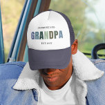 Promoted to Grandpa EST 2025 | New Grandparent  Trucker Hat<br><div class="desc">Celebrate a milestone moment in style with this "Promoted to Grandpa EST 2025" trucker hat! Designed with a modern, gender-neutral colour palette, this hat makes the perfect pregnancy announcement gift for new or expecting grandfathers. Great for Father’s Day, baby showers, or casual everyday wear to proudly share the exciting news....</div>