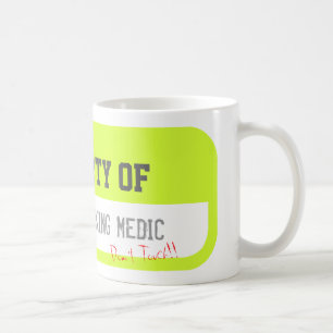PROPERTY OF ONE HARDWORKING MEDIC Yellow Mug