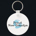 Proud New Grandpa Baby Girl Footprints Key Ring<br><div class="desc">Our Proud New Grandpa T-shirt design is available with blue or pink baby footprints for a baby girl or baby boy.  Our baby footprint new grandparent  announcement design is available on tees,  shirts,  sweatshirts,  tote bags,  hats,  buttons,  mugs & more.</div>