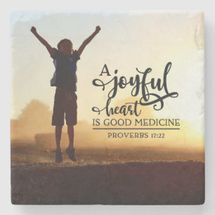 Proverbs 17:22 A cheerful heart is good medicine  Stone Coaster