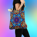 Psychedelic Kaleidoscope Blue Red and Green Tote Bag<br><div class="desc">This psychedelic kaleidoscope flower design features blue,  red,  and green. Vibrant trippy visuals for the modern hippie or anyone who loves bright funky colours!</div>