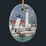 Puerto Morelos Lighthouse Ceramic Tree Decoration<br><div class="desc">Oval ceramic ornament with an image of a lighthouse and leaning tower in Puerto Morelos,  Quintana Roo,  Mexico. Red back. See the entire Mexico Ornament collection in the HOME section.</div>