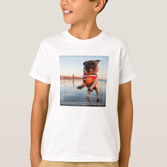 Pug Playing Ball on Beach T-Shirt (Front)