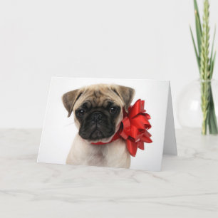 Pug Puppy Wrapped in a Christmas Bow Holiday Card