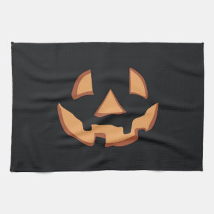 Pumpkin face for Halloween Tea Towel