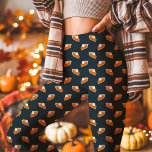 Pumpkin Pie Fall Thanksgiving Navy Leggings<br><div class="desc">Celebrate the season in style with these Pumpkin Pie Fall Thanksgiving Navy Leggings. Featuring a delightful pumpkin pie pattern against a deep navy background, these leggings offer a cosy yet playful design perfect for Thanksgiving gatherings or everyday fall wear. Enjoy the warmth and festive flair they bring to your fall...</div>