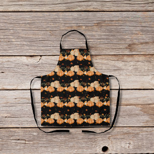 Pumpkin pies and brown sugar cubes black apron