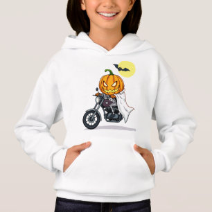 Pumpkin rides motorcycle