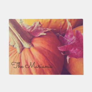 Pumpkins and autumn leaves doormat