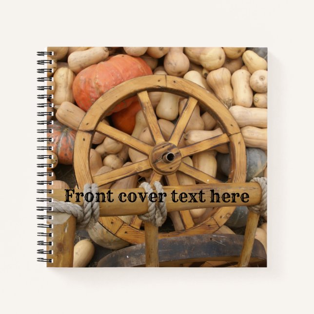 Pumpkins and Wheel of the rural wooden cart Notebook (Front)