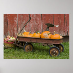 Pumpkins in old wagon poster