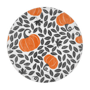 Pumpkins, leaves: cute autumn pattern. cutting board