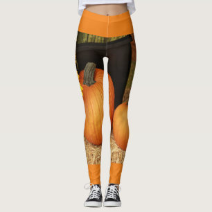 pumpkins outdoors in fall leggings
