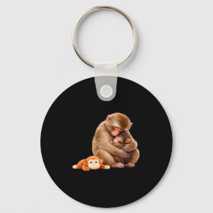 Punch the monkey cuddling stuffed animal meme key ring