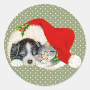 Puppy and Kitten Sleeping Under Santa's Hat Classic Round Sticker