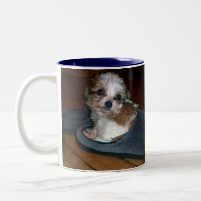 Puppy in a slipper. Two-Tone coffee mug (Left)