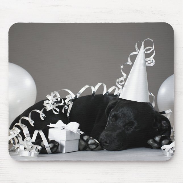 Puppy sleeping in party decorations mouse mat (Front)