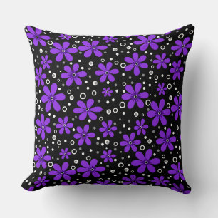 purple bright flowers on a black background with w cushion