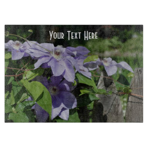 Purple Clematis Flowers On Fence Nature Cutting Board