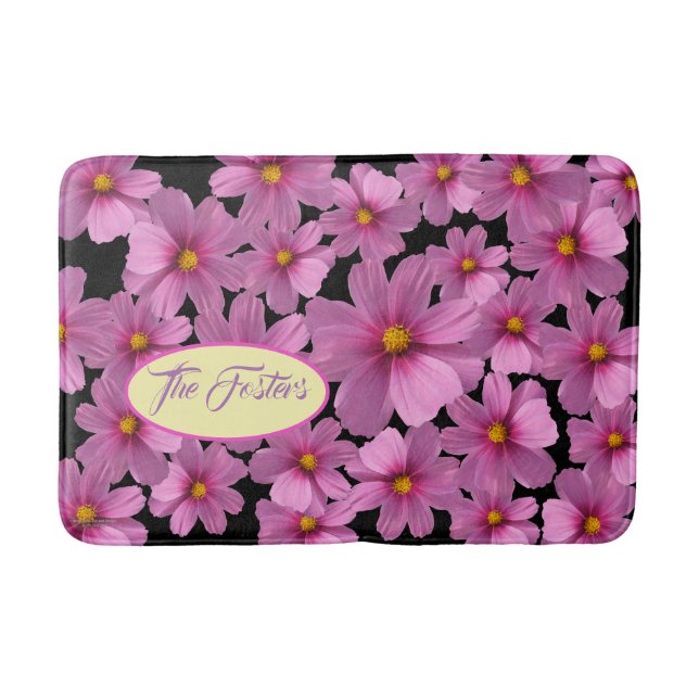 Purple Cosmos Flower Design on a Black Background Bath Mat (Front)