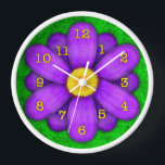 Purple Daisy Flower on Green Beautiful Wall Clock<br><div class="desc">This pretty floral clock has an original stylised flower, in a daisy style and coloured shades of purple. The yellow-orange clock numbers mark the time on the twelve petals. The background is done in an abstract mottled green, resembling grass. This is a bright, bold clock for a gardener or any...</div>